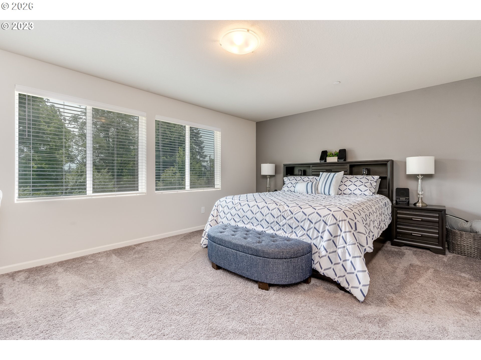 6150 North 86th Avenue Camas, WA 98607 - Photo 29 of 41 a bedroom with a bed and a large window