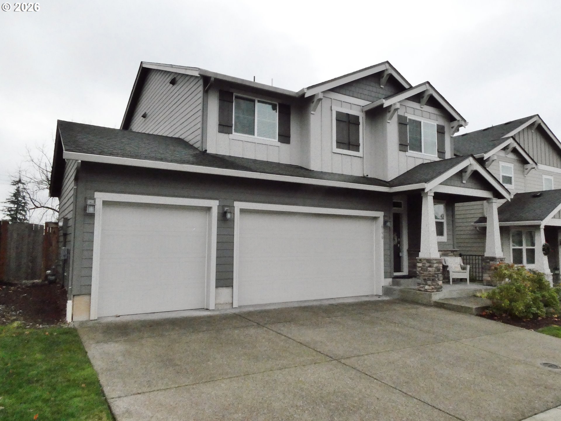 6150 North 86th Avenue Camas, WA 98607 - Photo 40 of 41 a front view of a house with a garage