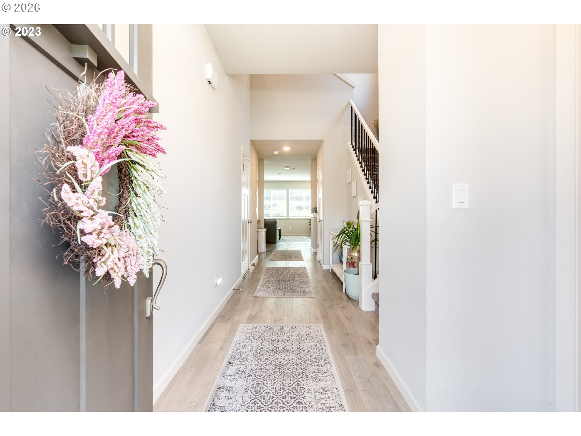 6150 North 86th Avenue Camas, WA 98607 - Photo 5 of 41 a hallway with painting and flowers