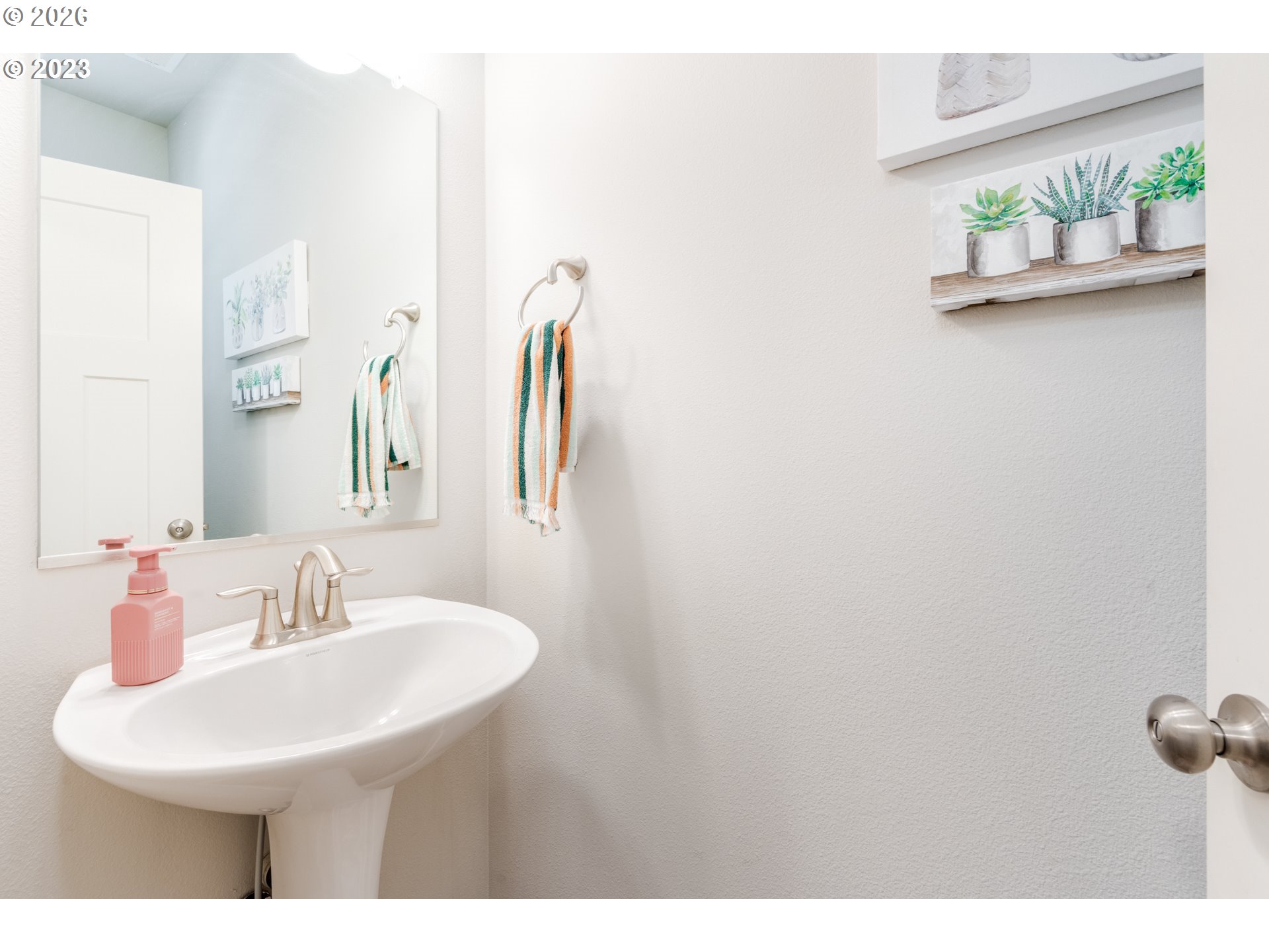 6150 North 86th Avenue Camas, WA 98607 - Photo 8 of 41 a bathroom with a sink and a mirror