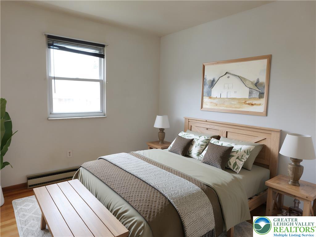 21 Will Barnesville, PA 18214 - Photo 14 of 23 Natural light bathes this comfortable bedroom, featuring gleaming hardwood flooring and ample wall space.