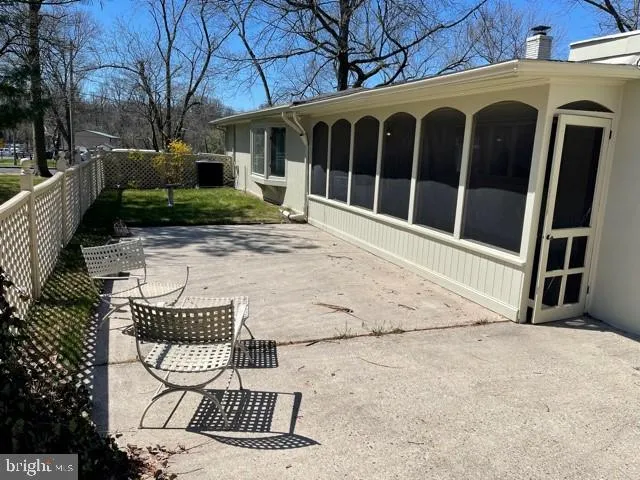 a view of a house with a large window