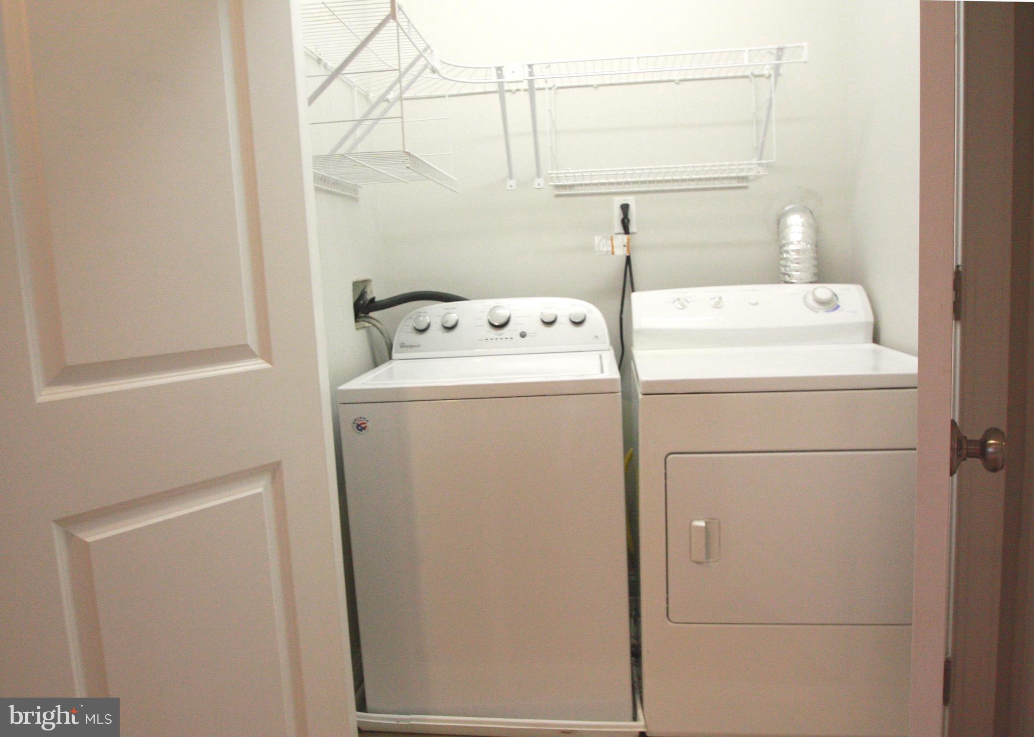 763 South 15th Street, Unit 2 Philadelphia, PA 19146 - Photo 9 of 12 a utility room with dryer and washer