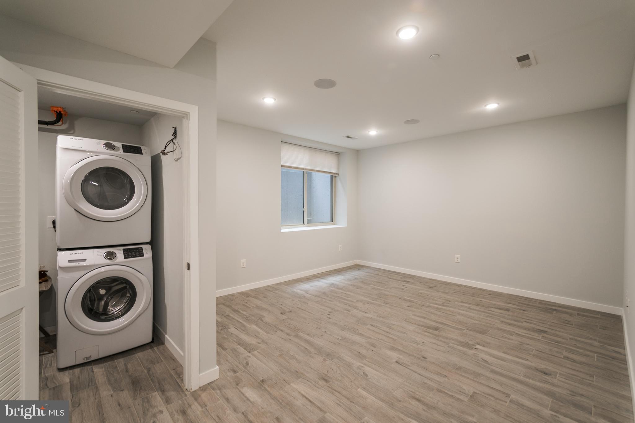 1524 North 8th Street, Unit 2 Philadelphia, PA 19122 - Photo 17 of 22 a view of washer and dryer in a room