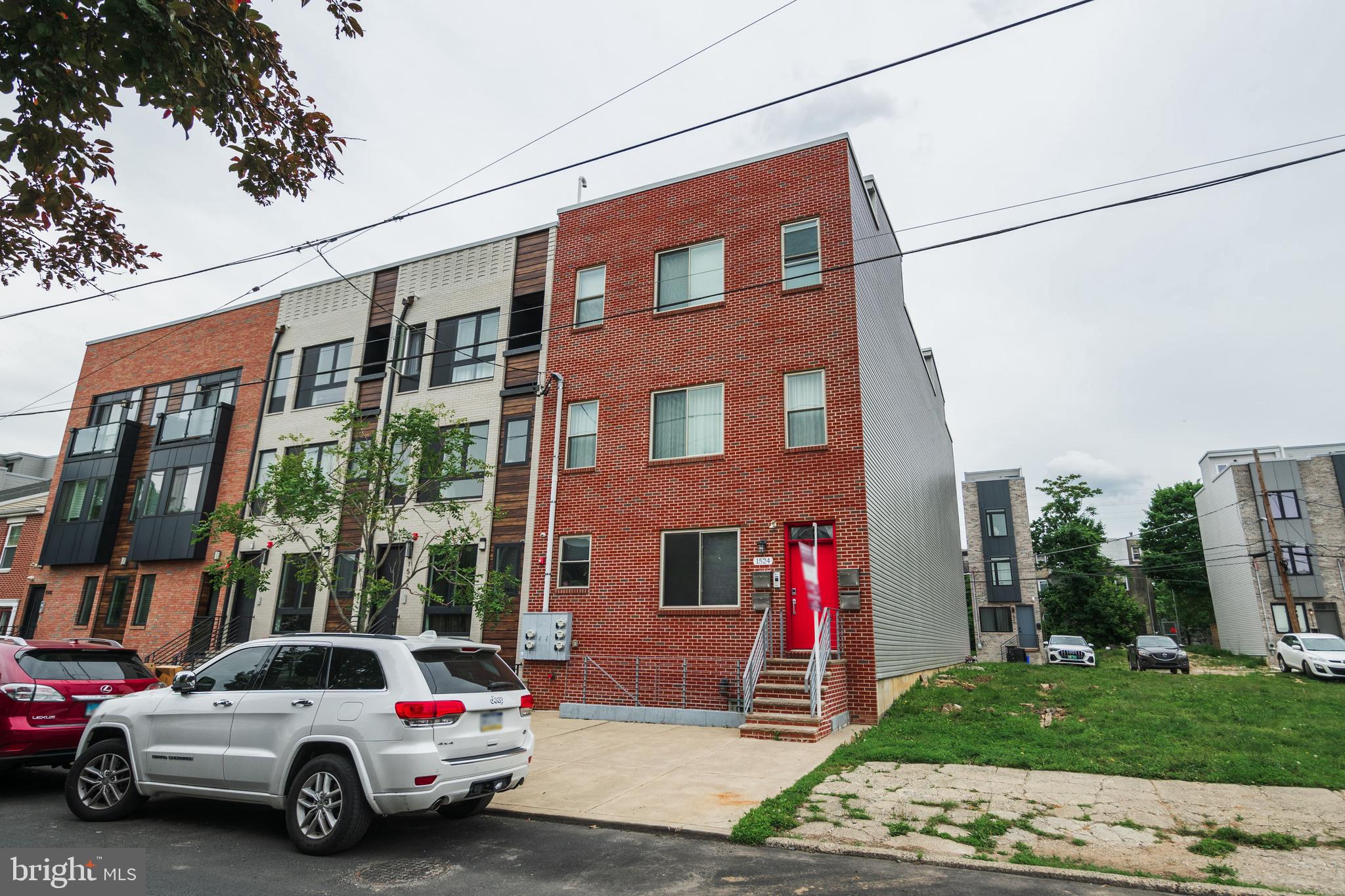 1524 North 8th Street, Unit 2 Philadelphia, PA 19122 - Photo 22 of 22 a car parked in front of a building