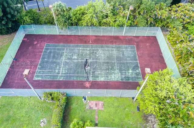 a view of yard with swimming pool and outdoor seating