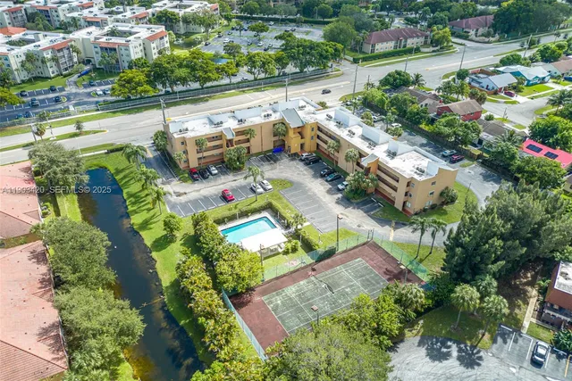 a view of a chairs and table in patio