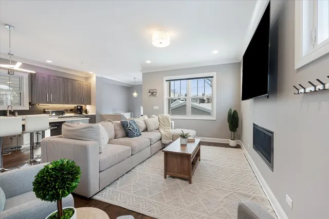 a room with a book shelf and a wooden floor