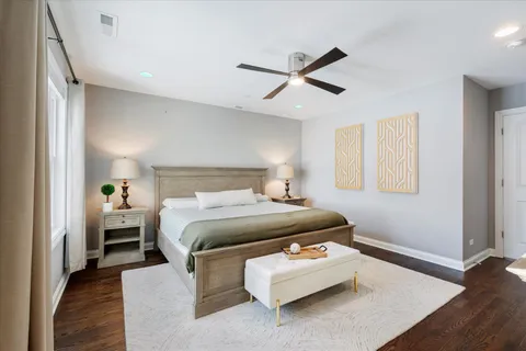 a white bath tub sitting next to a bathroom sink