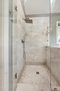 a utility room with closet and window