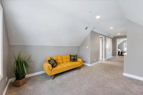 a view of the house covered in snow