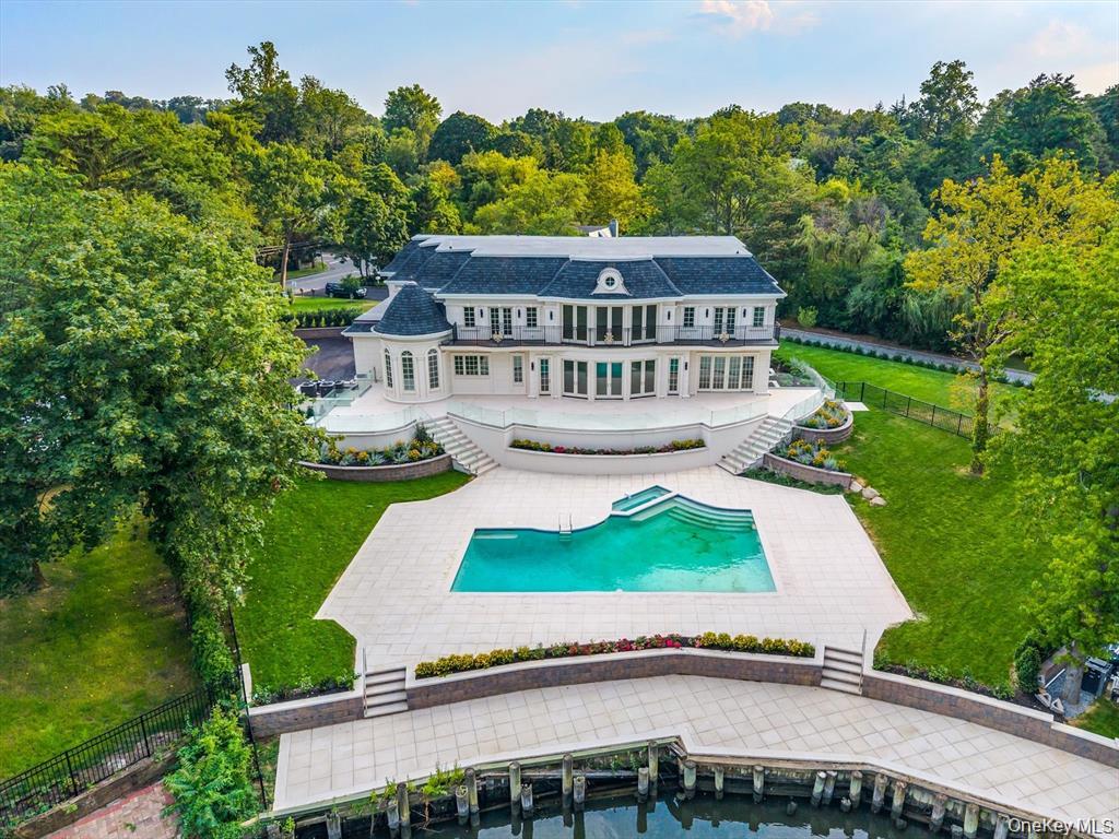 566 East Shore Road Great Neck, NY 11024 - Photo 3 of 50 a view of a house with a yard