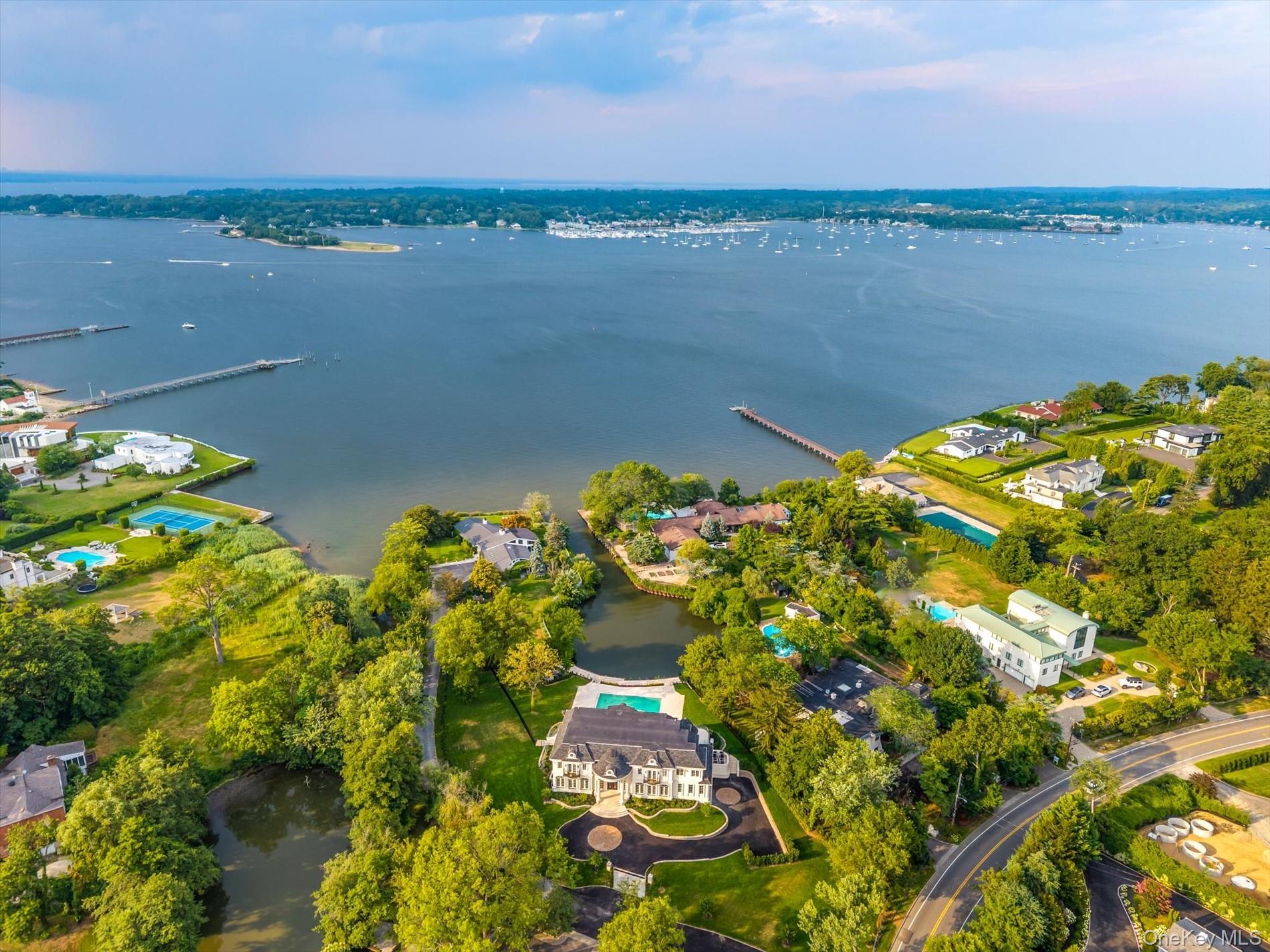 566 East Shore Road Great Neck, NY 11024 - Photo 42 of 50 a view of a lake with a city view