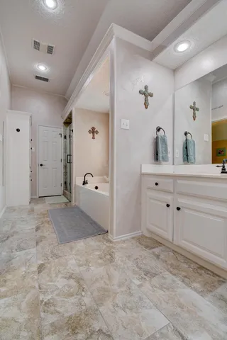 a view of a house with sitting area and garden