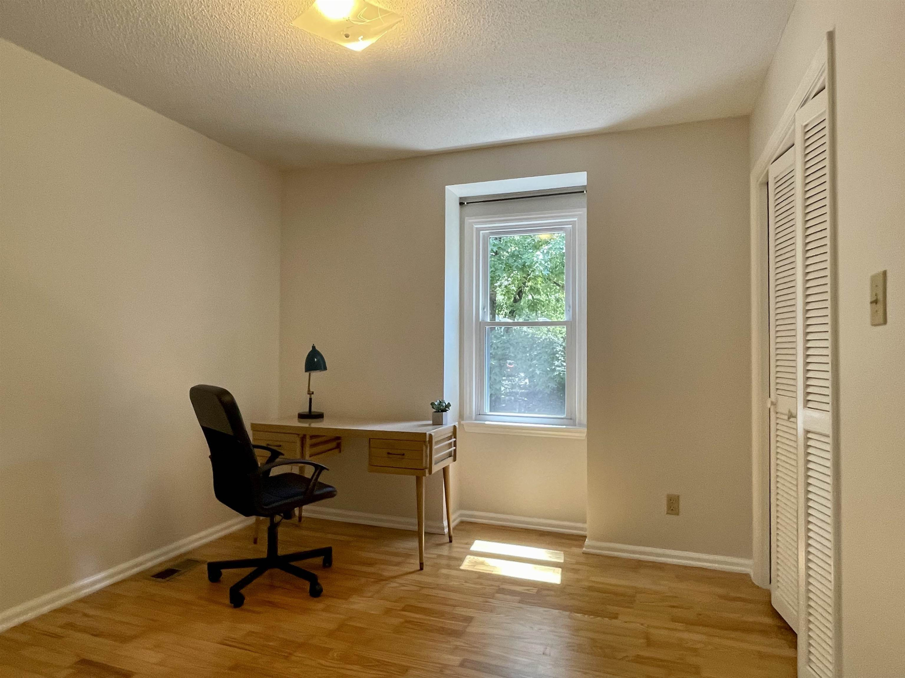 4506 Malvern Road Durham, NC 27707 - Photo 28 of 40 Third upstairs bedroom features hardwood floors and would make a great office. Bedroom #3