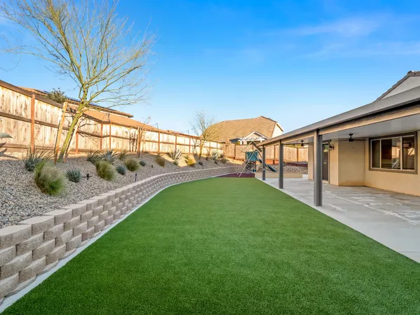 a view of a porch and garden