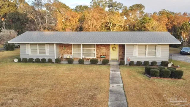 front view of a house with a patio