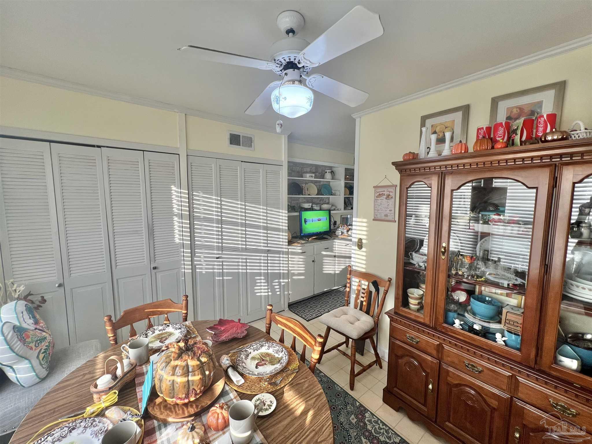 205 Highland Avenue Atmore, AL 36502 - Photo 9 of 43 a living room with furniture and a table