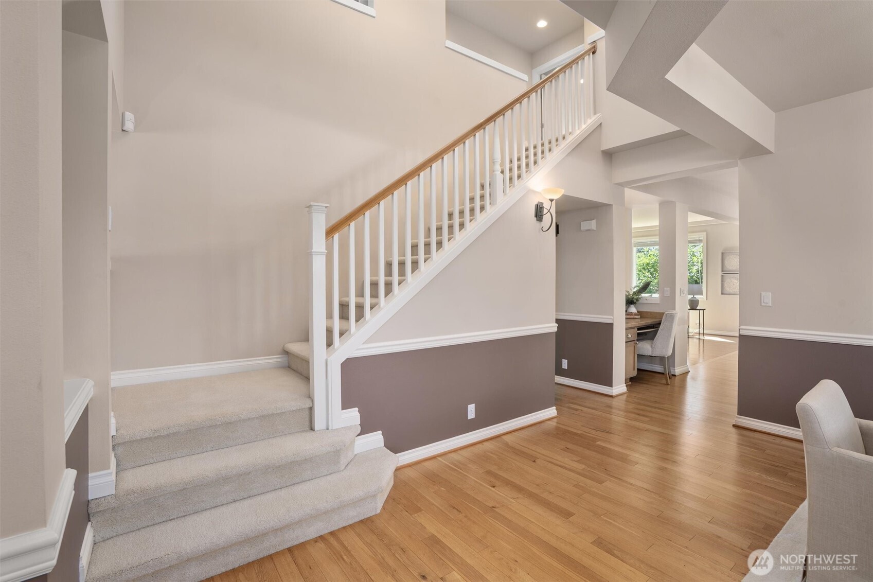 5503 Northeast 2nd Court Renton, WA 98059 - Photo 14 of 39 a view of entryway and hall with wooden floor