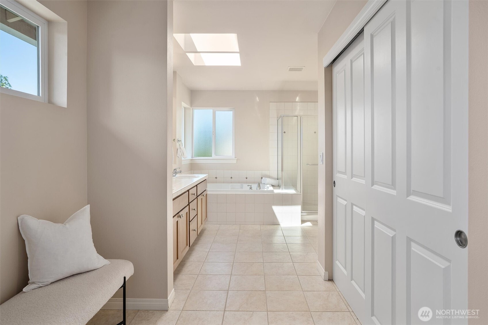 5503 Northeast 2nd Court Renton, WA 98059 - Photo 20 of 39 a bathroom with a sink a toilet and tub