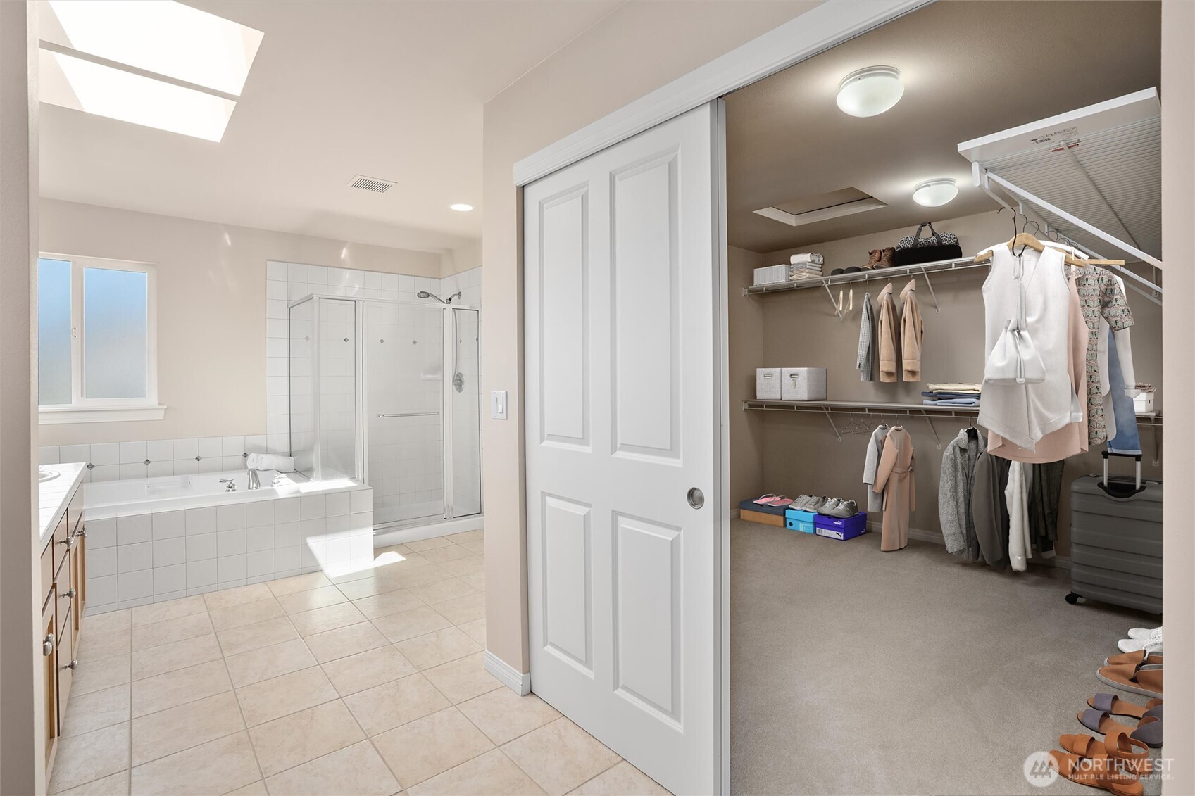 5503 Northeast 2nd Court Renton, WA 98059 - Photo 23 of 39 a bathroom with a tub sink and mirror