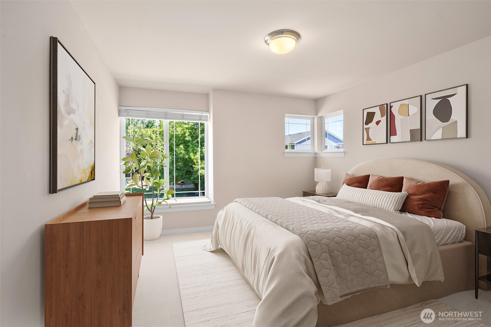5503 Northeast 2nd Court Renton, WA 98059 - Photo 24 of 39 a bedroom with a large bed and a window