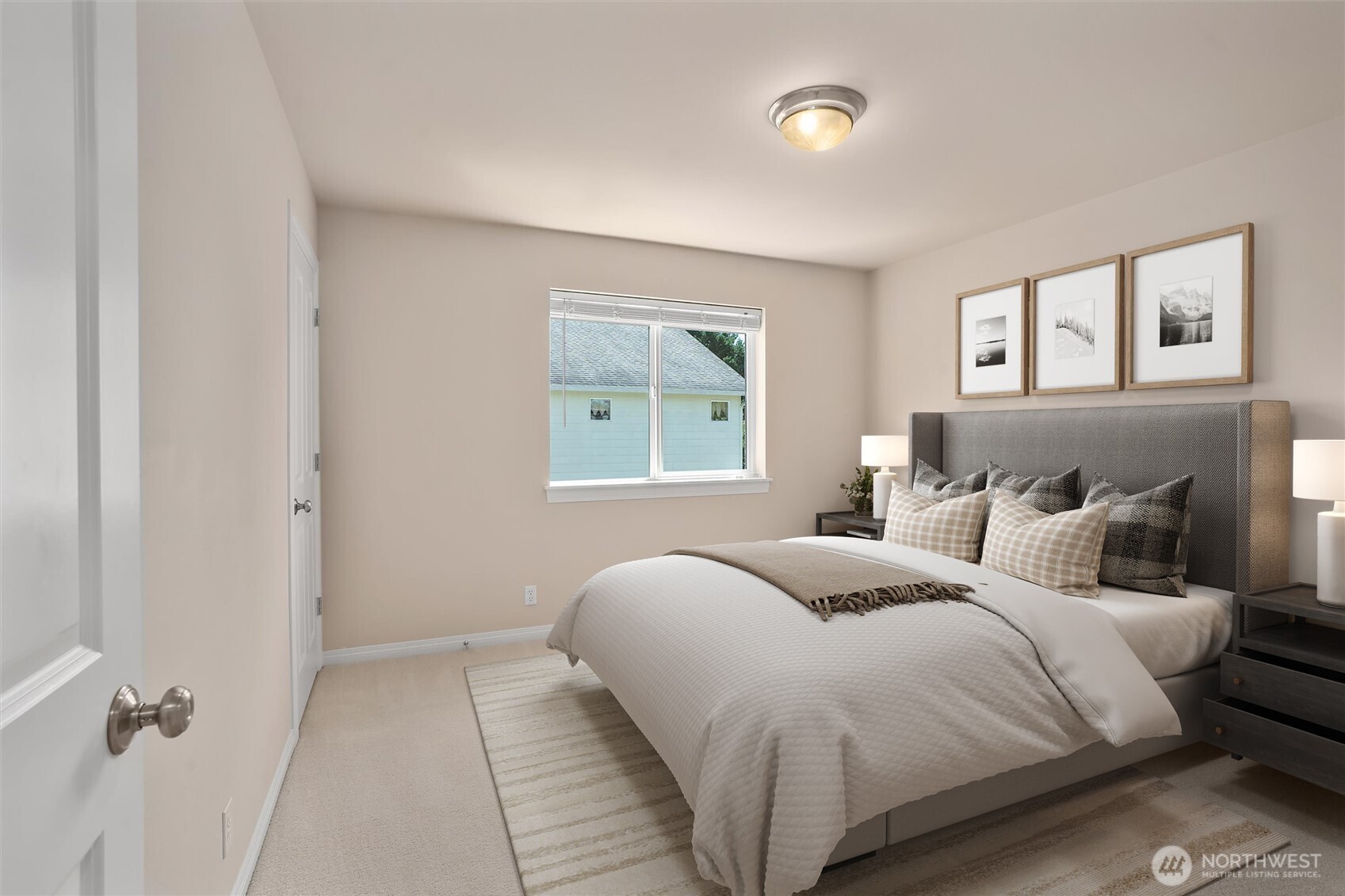 5503 Northeast 2nd Court Renton, WA 98059 - Photo 25 of 39 a bedroom with a large bed and a window