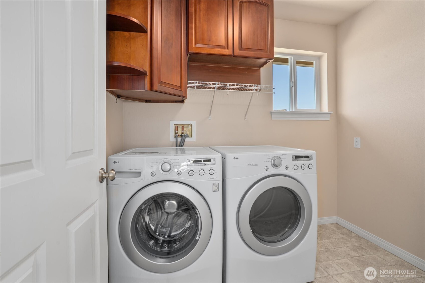 5503 Northeast 2nd Court Renton, WA 98059 - Photo 27 of 39 a utility room with dryer and washer