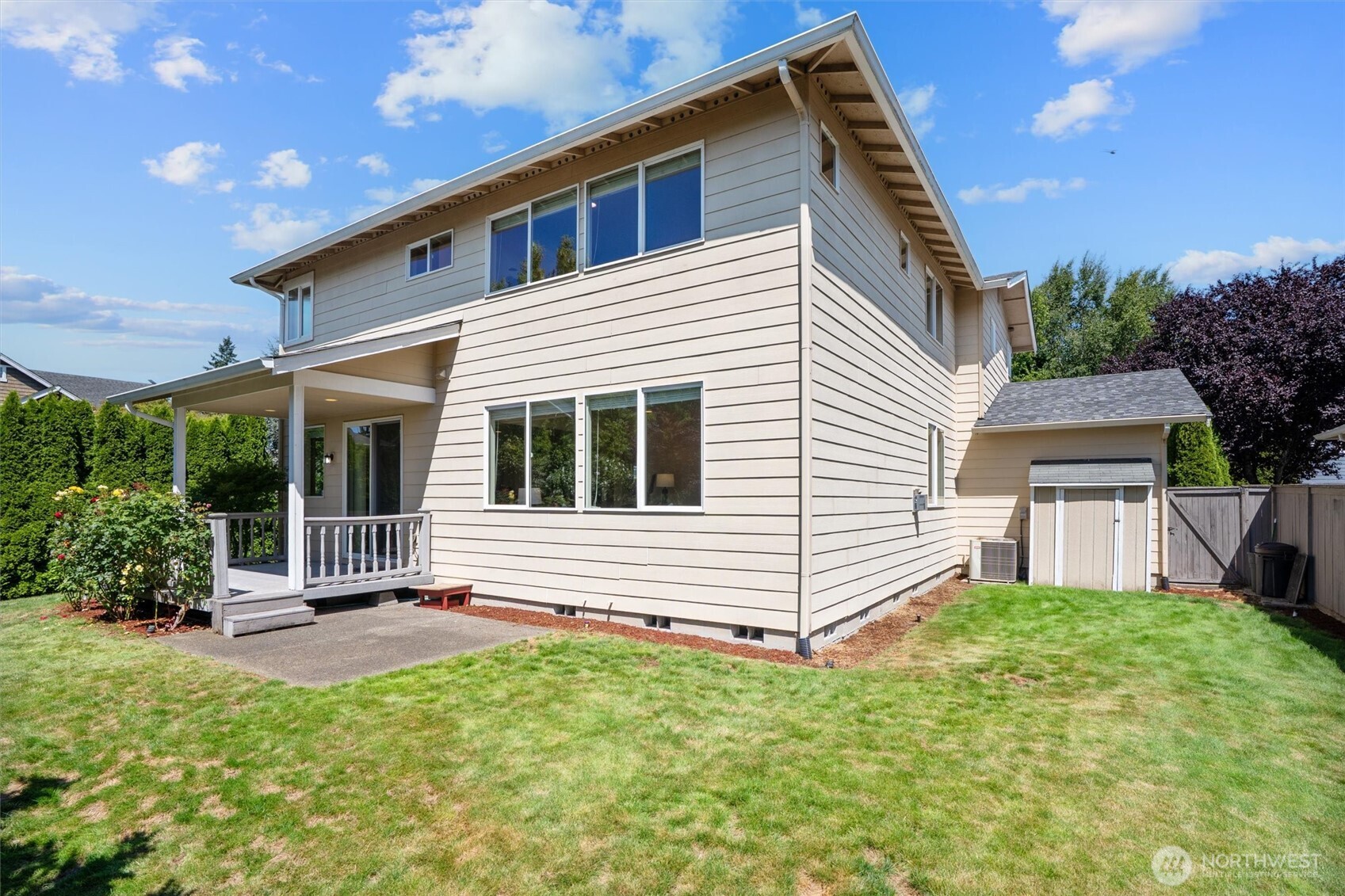 5503 Northeast 2nd Court Renton, WA 98059 - Photo 30 of 39 a front view of a house with garden