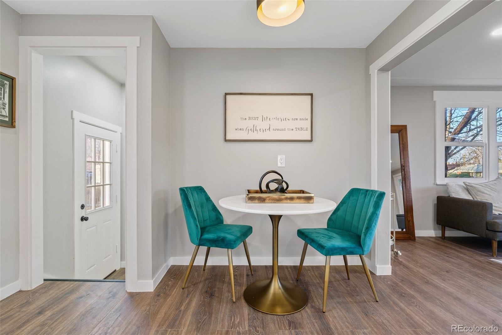 1853 South Decatur Street Denver, CO 80219 - Photo 9 of 22 a view of a livingroom with furniture and a window