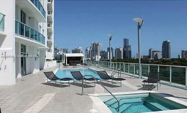 2525 Southwest 3rd Avenue, Unit 906 Miami, FL 33129 - Photo 20 of 23 a view of a terrace with chairs