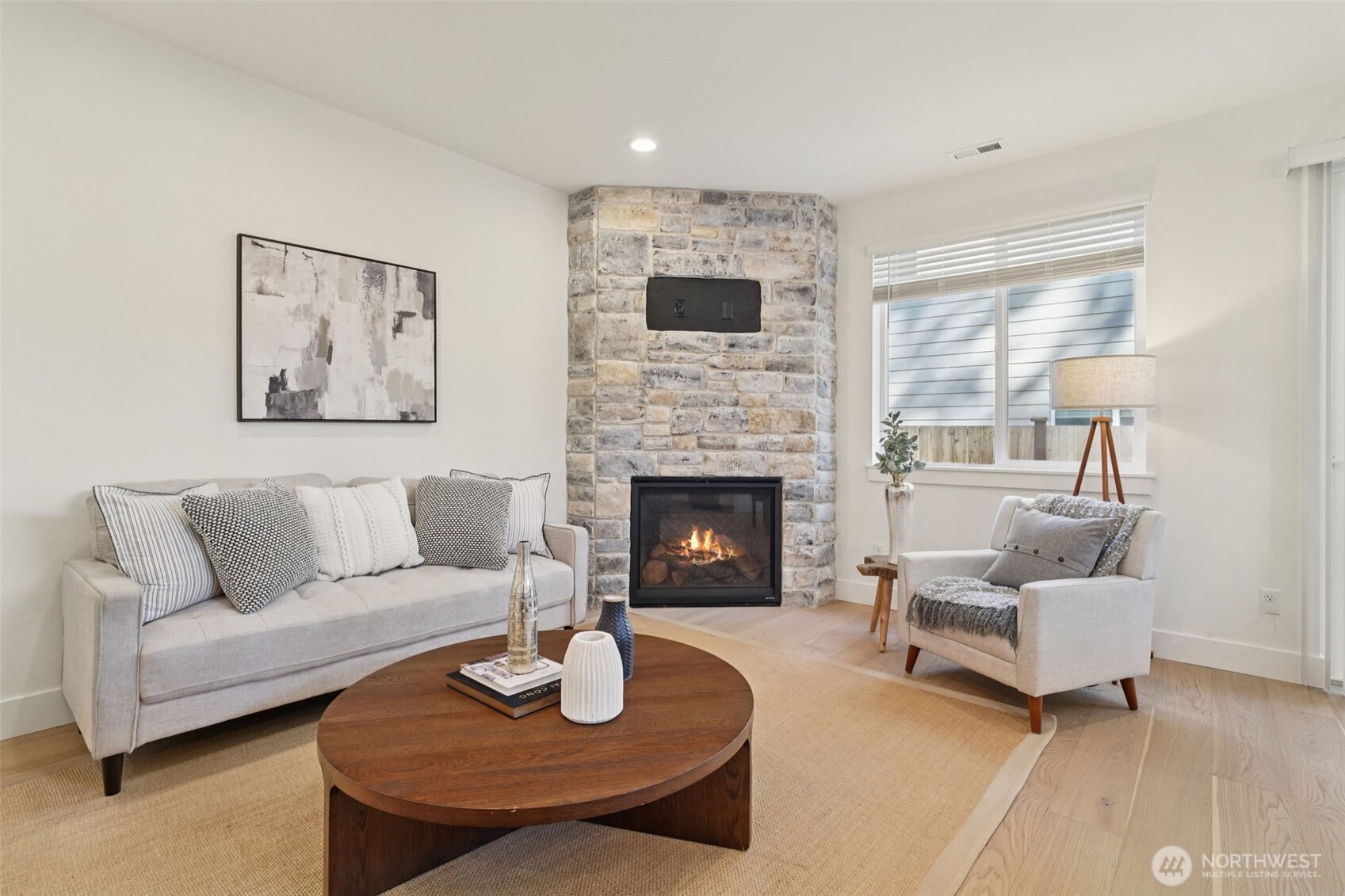 8014 222nd Street Southwest Edmonds, WA 98026 - Photo 7 of 29 a living room with furniture and a fireplace