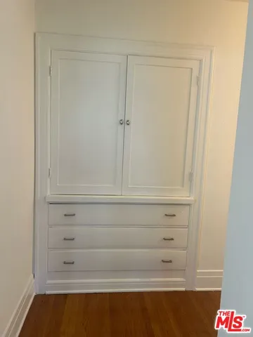 a view of a pathway both side of the house