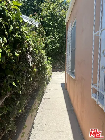 a view of a backyard of the house