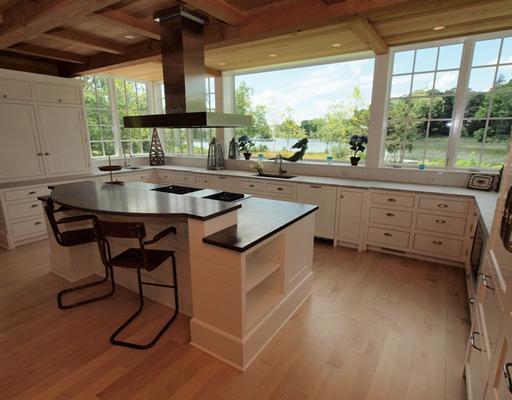 Undisclosed Address Darien, CT 06820 - Photo 11 of 20 a kitchen with stainless steel appliances granite countertop a sink and a large window