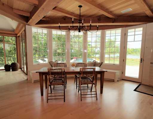 Undisclosed Address Darien, CT 06820 - Photo 14 of 20 a view of a dining room with furniture window and outside view
