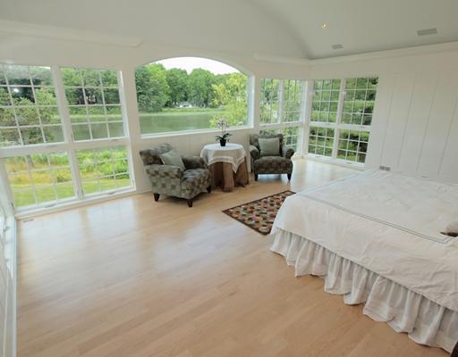 Undisclosed Address Darien, CT 06820 - Photo 16 of 20 a living room with furniture and a large window