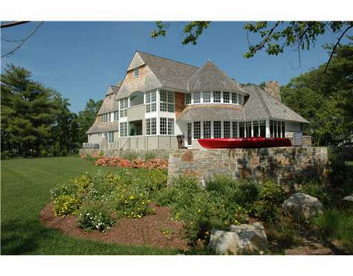 Undisclosed Address Darien, CT 06820 - Photo 6 of 20 a view of a house with a yard and potted plants