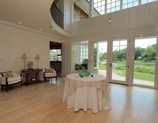 Undisclosed Address Darien, CT 06820 - Photo 8 of 20 a living room with furniture and large windows