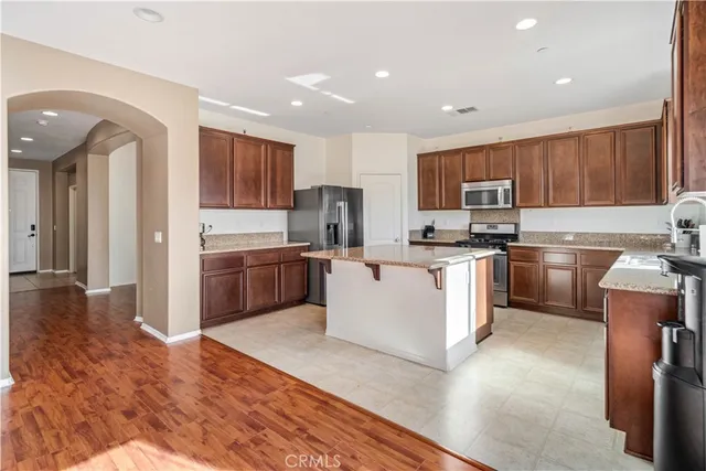 a kitchen with cabinets a sink and a stove