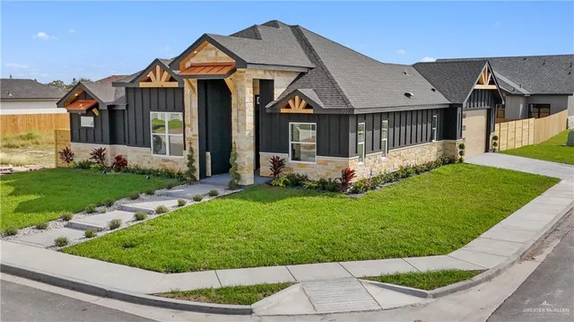 a view of a house with a garden