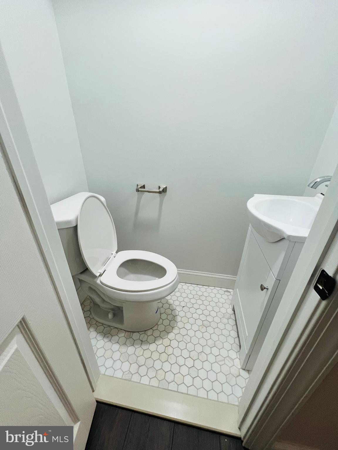 223 Maypole Road Upper Darby, PA 19082 - Photo 20 of 48 a white toilet sitting next to a small bathroom