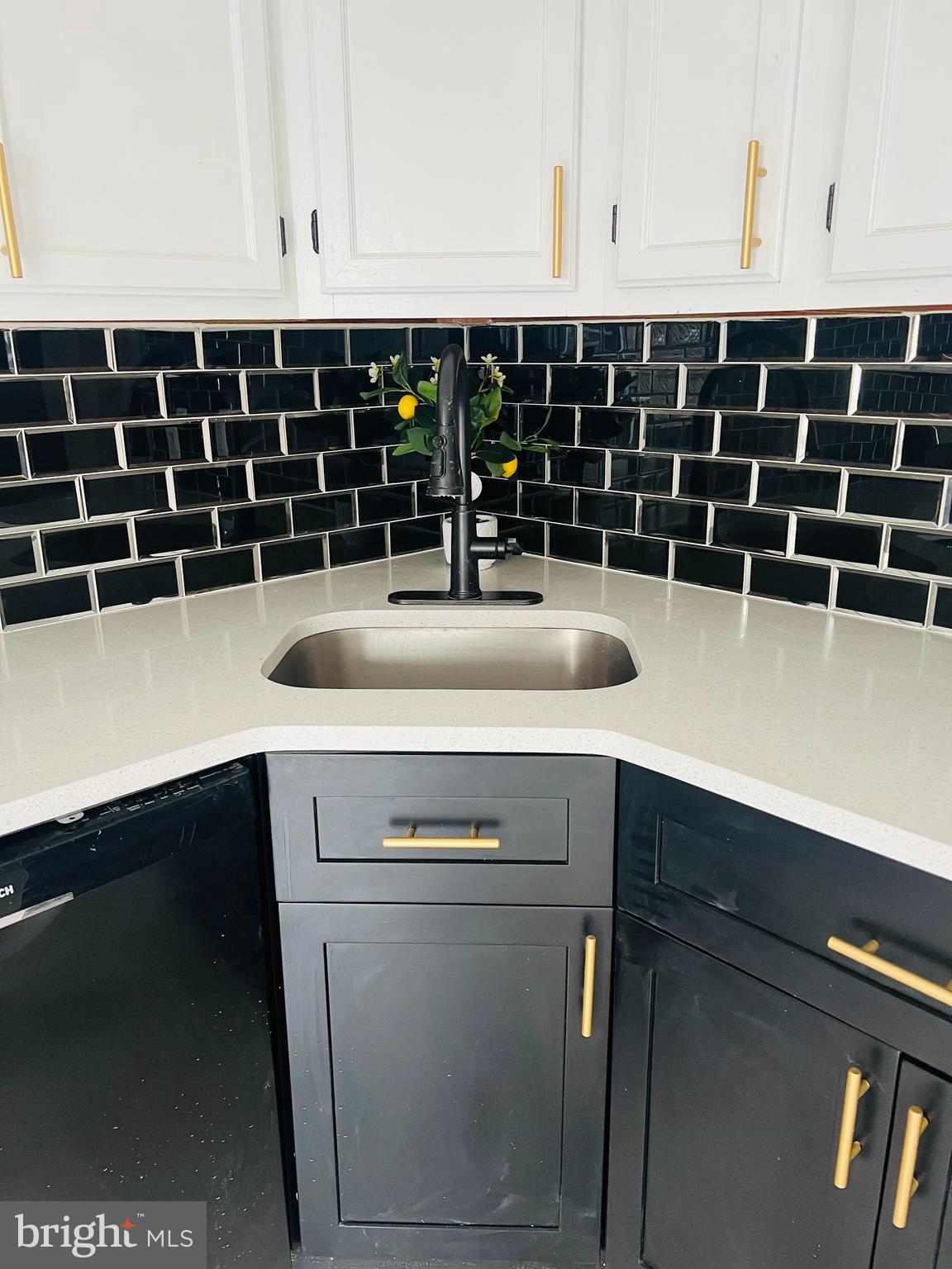 223 Maypole Road Upper Darby, PA 19082 - Photo 29 of 48 a kitchen with a sink and cabinets