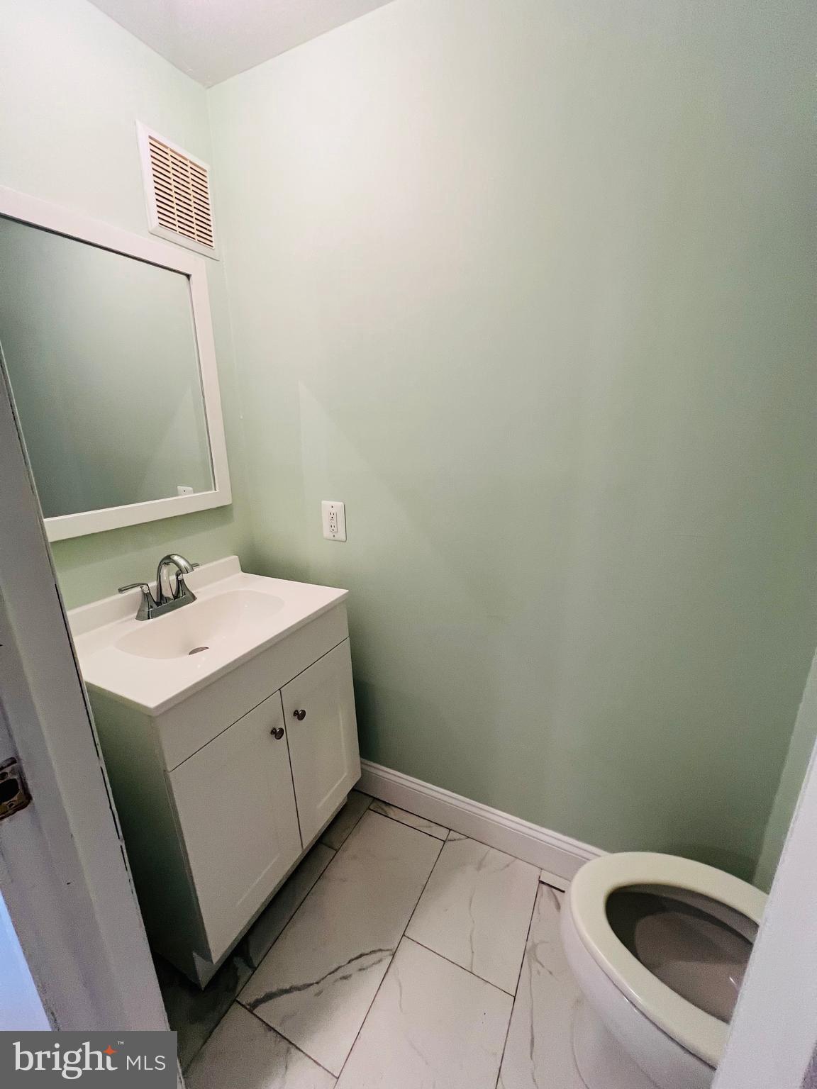 223 Maypole Road Upper Darby, PA 19082 - Photo 33 of 48 a bathroom with a sink and a toilet