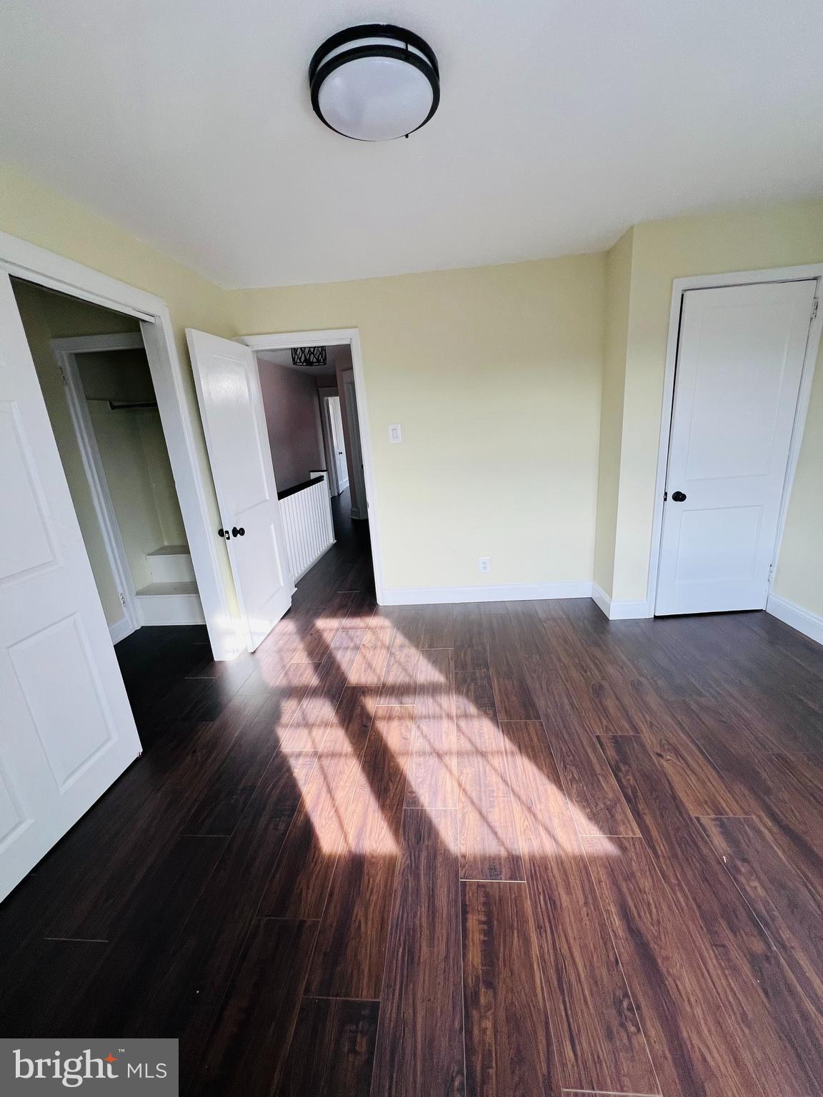 223 Maypole Road Upper Darby, PA 19082 - Photo 5 of 48 a bedroom with a bed and a large window