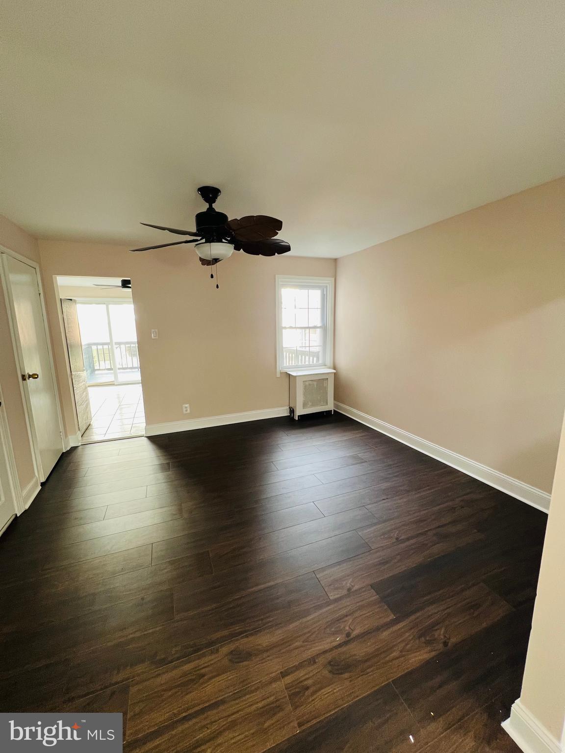 223 Maypole Road Upper Darby, PA 19082 - Photo 10 of 48 a view of a room with wooden floor and windows