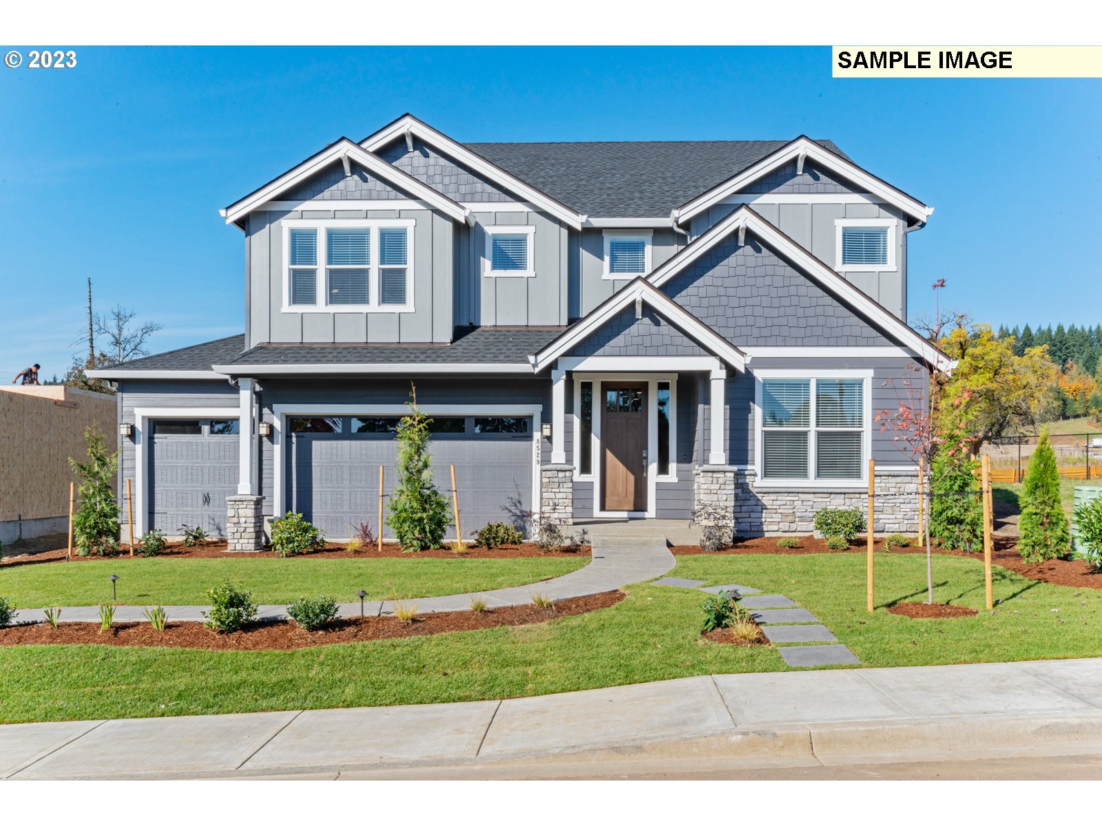 5657 North 92nd Avenue Camas, WA 98607 - Photo 1 of 32 a front view of a house with a yard