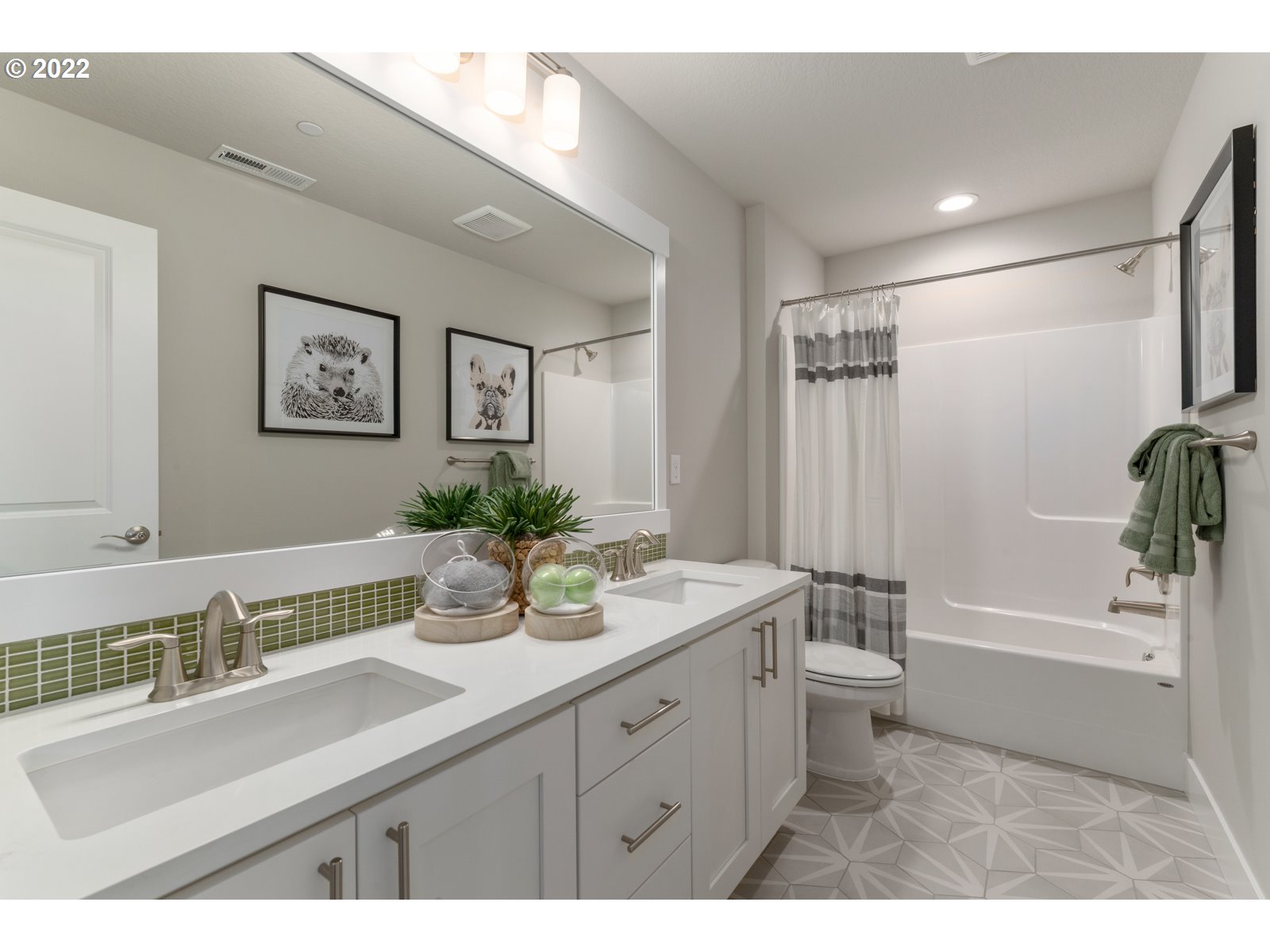 5657 North 92nd Avenue Camas, WA 98607 - Photo 17 of 32 a bathroom with a sink a toilet and tub