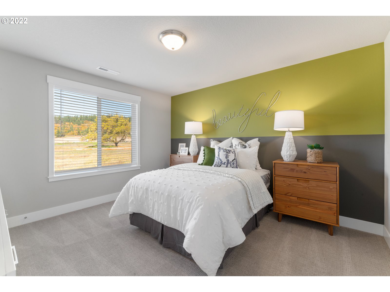 5657 North 92nd Avenue Camas, WA 98607 - Photo 20 of 32 a bedroom with a bed and lamps