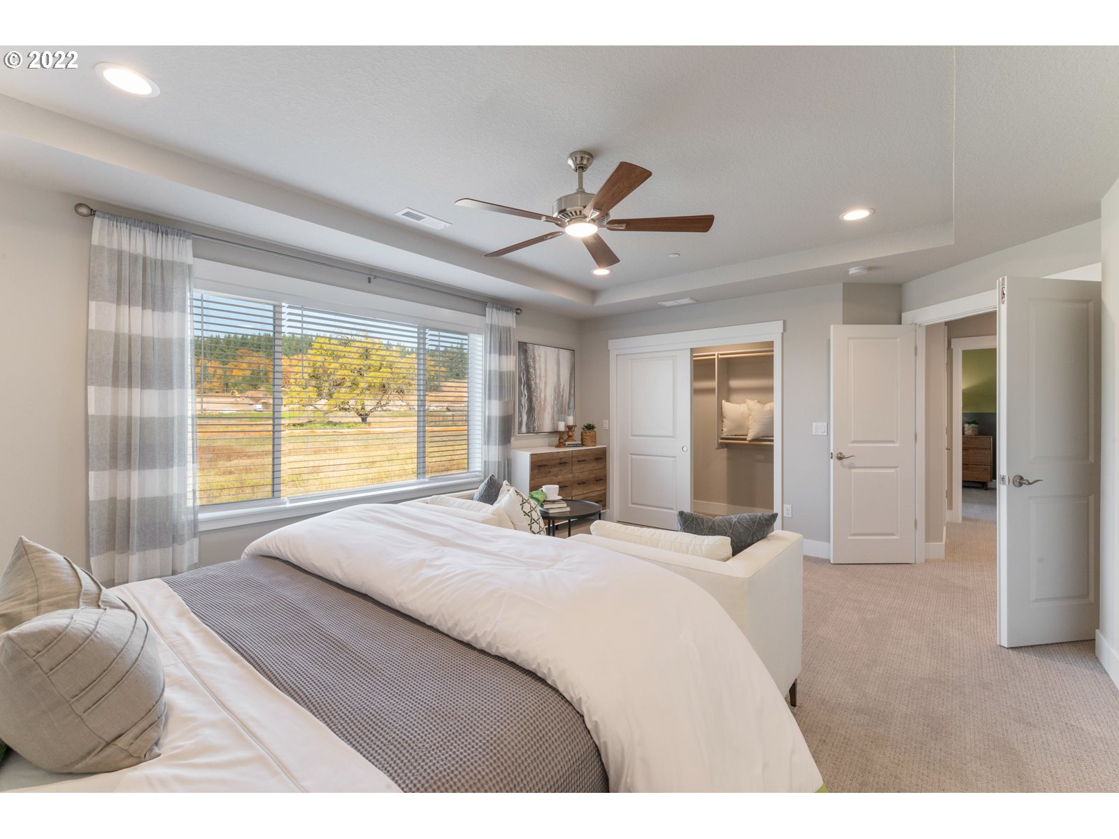 5657 North 92nd Avenue Camas, WA 98607 - Photo 30 of 32 a bedroom with a bed and a large window